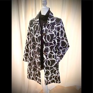 Breakfast at Tiffany’s vibe fully lined coat.